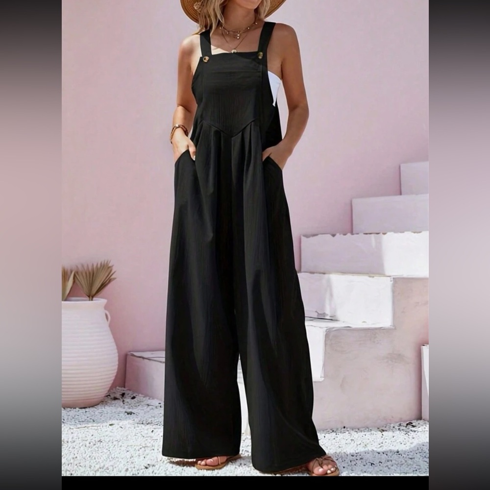 Solid color black jumpsuit with buttons